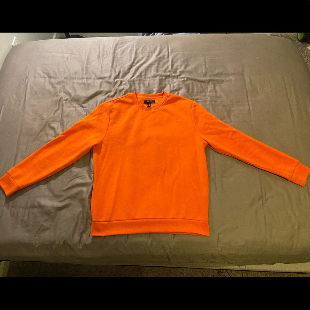 Large orange crew neck